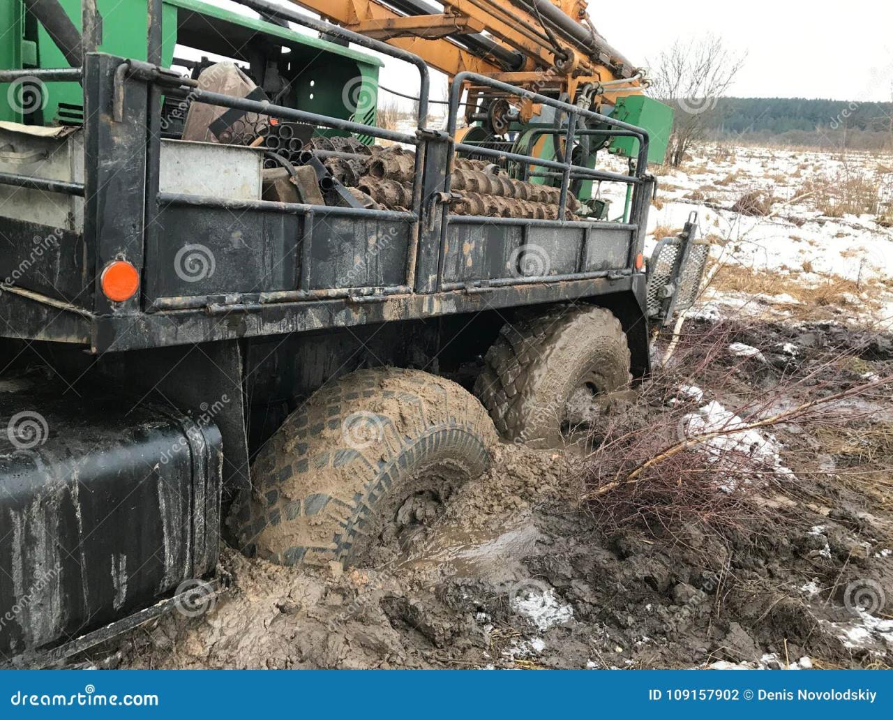 A Tow Truck Stuck in the Mud. Stock Photo - Image of cold, equipment ... A Tow Truck Stuck in the Mud. Stock Photo - Image of cold, equipment ...